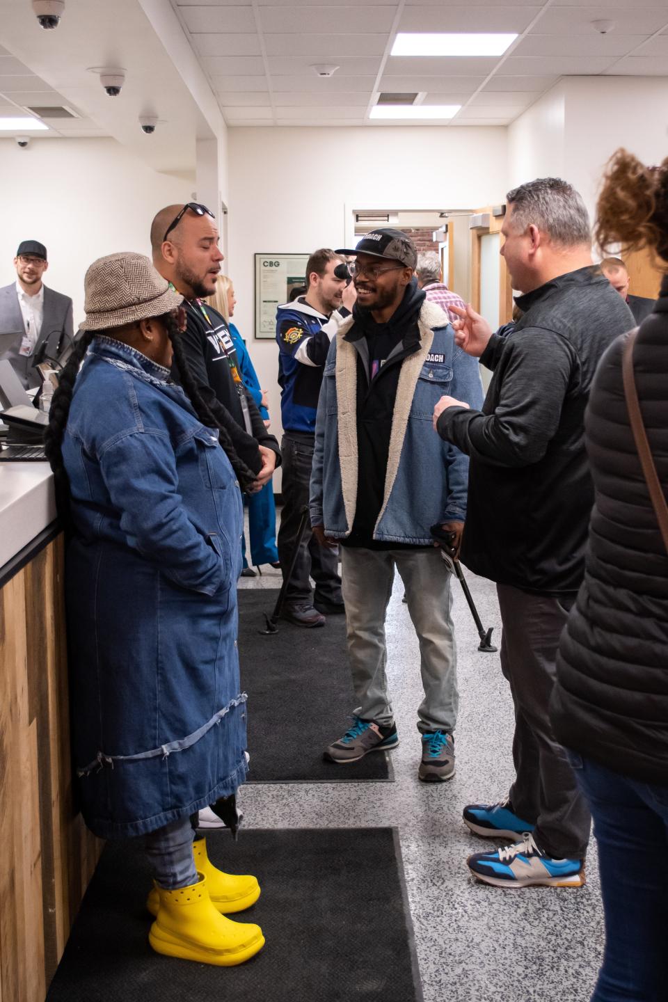 Media, business consultants, and industry representatives from Vapen, BeneLeaves, and Leafwell visit the new Backroad Wellness dispensary.