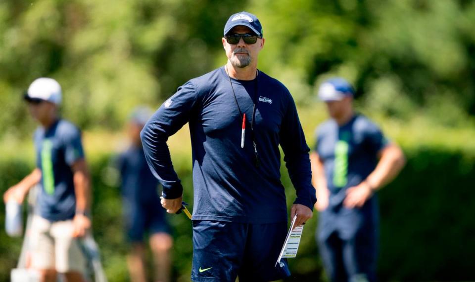 Seahawks offensive coordinator Ryan Grubb watches during the first day of training camp at the Virginia Mason Athletic Center, on Wednesday, July 24, 2024, in Renton.