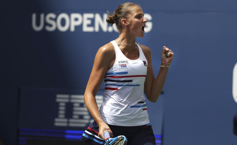 Karolina Pliskova, of the Czech Republic, pumps her fist after wining a point against Johanna Konta, of the United Kingdom, during round four of the US Open tennis championships Sunday, Sept. 1, 2019, in New York. (AP Photo/Kevin Hagen)