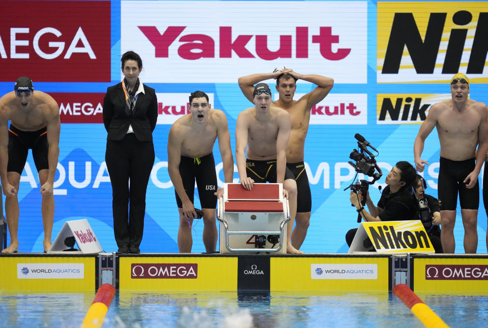 United States team reacts during Men 4 x 100 meter freestyle relay finals at the World Swimming Championships in Fukuoka, Japan, Sunday, July 23, 2023. (AP Photo/Lee Jin-man)