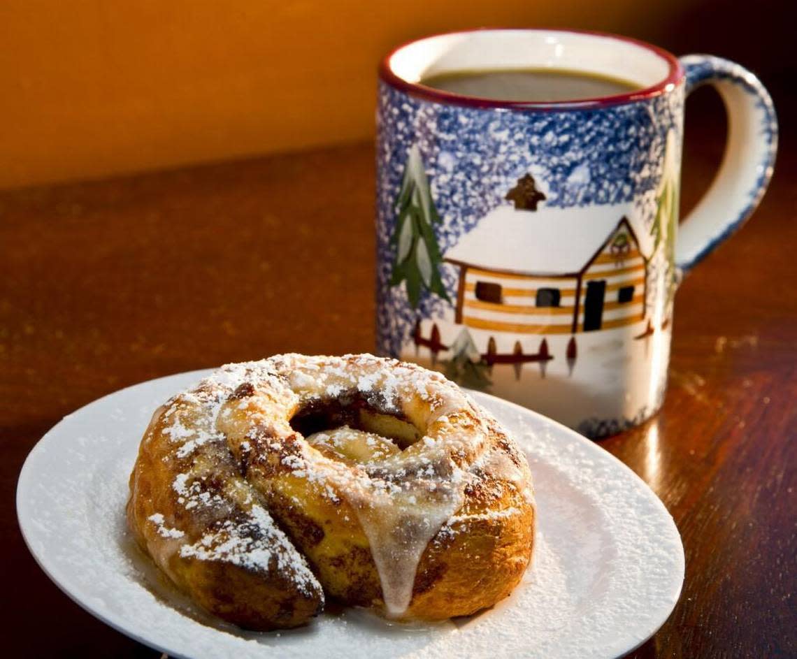 Among the menu possibilities at Between Friends Coffee in Houston County are coffee and a cinnamon roll.