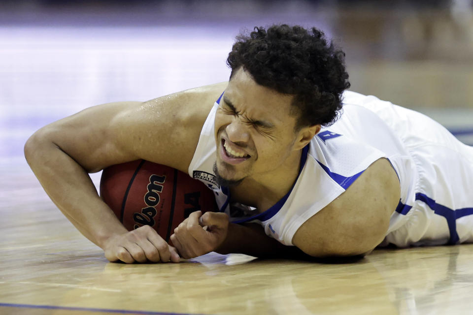 Seton Hall guard Bryce Aiken reacts after falling to the court during the second half of an NCAA college basketball game aginast Villanova on Saturday, Jan. 1, 2022, in Newark, N.J. Villanova won 73-67. (AP Photo/Adam Hunger)