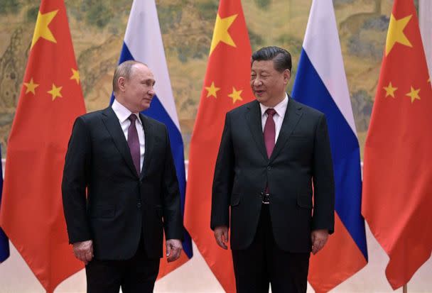 PHOTO: Russian President Vladimir Putin, left, and Chinese President Xi Jinping pose for a photo during their meeting in Beijing, Feb. 4, 2022.  (Sputnik via AFP/Getty Images)