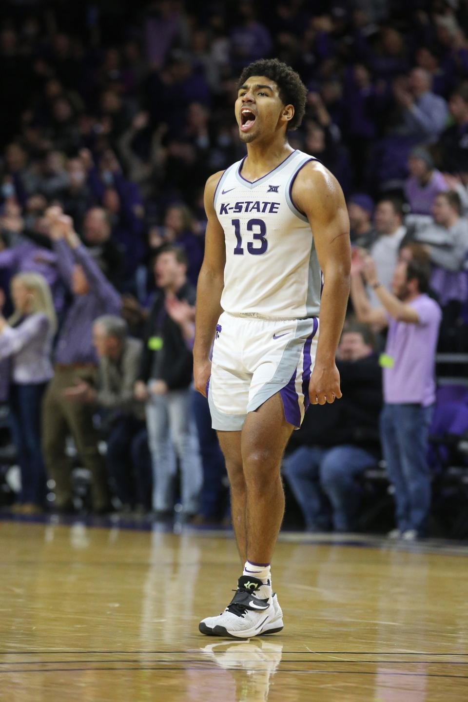 Jan 15, 2022; Manhattan, Kansas, USA;  Kansas State Wildcats guard Mark Smith (13) reacts to a play during the second half against the Texas Tech Red Raiders at Bramlage Coliseum. Mandatory Credit: Scott Sewell-USA TODAY Sports ORG XMIT: IMAGN-462420 ORIG FILE ID:  20220115_jla_as4_107.jpg