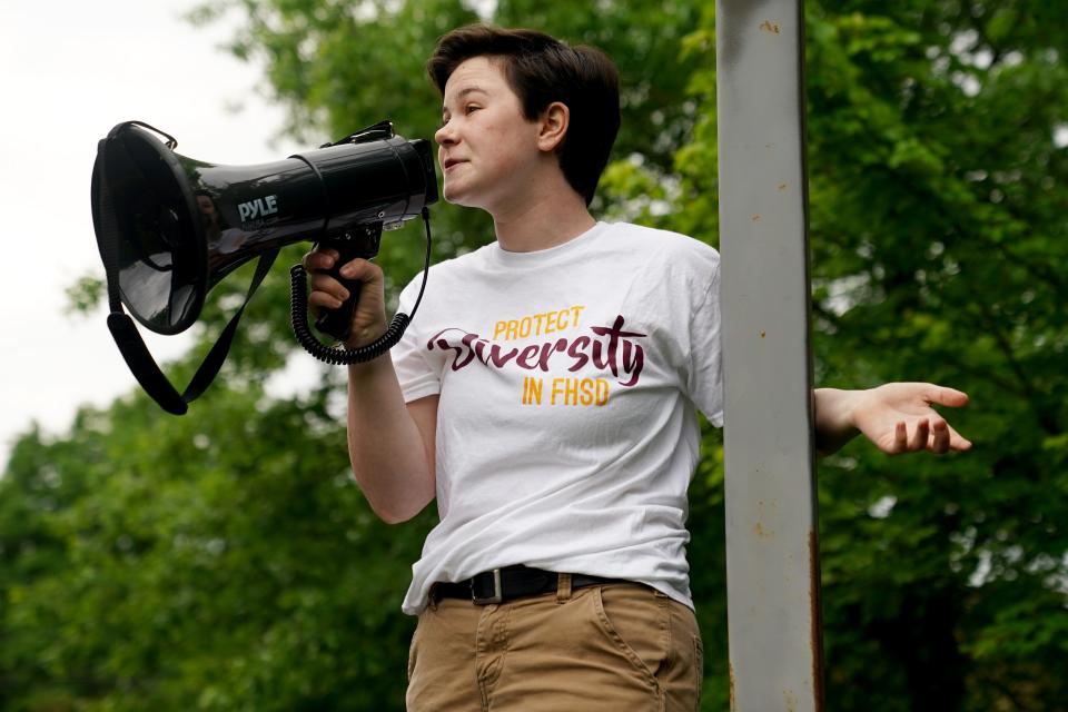 Claire Mengel speaks to about 350 students, according to organizers, from Turpin High School who walked out of class in protest of the cancelation of "Diversity Day," Wednesday, May 18, 2022, to the Heritage Universalist Unitarian Church in Anderson Township, Ohio. Administrators postponed the event on short notice due to parent and board concerns and rescheduled the event for mid-May. The school board then banned the event from occurring on school property or with school funds.