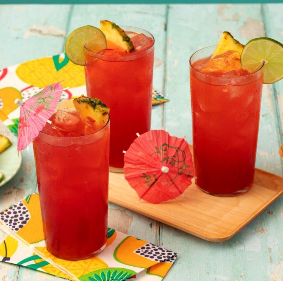 bay breeze cocktail with paper umbrellas and pineapple