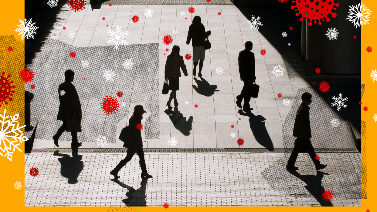 Black and white image of people walking around outside with red coronavirus and white snowflakes in the air