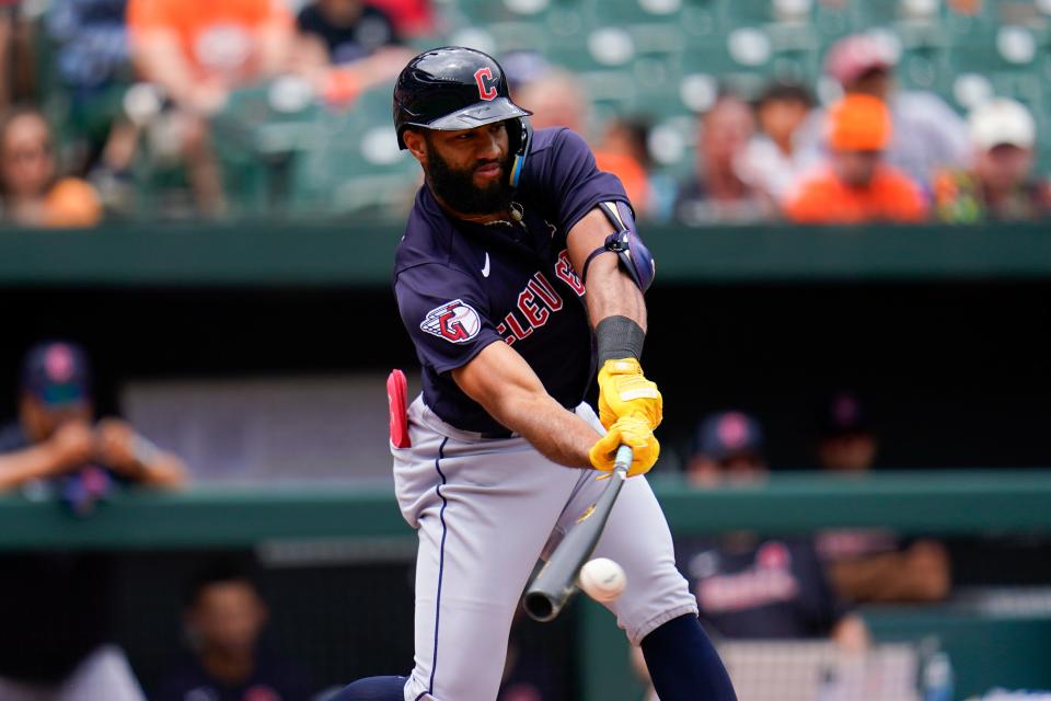 Cleveland Guardians' Amed Rosario swings at a pitch from the Baltimore Orioles during the first inning of a baseball game, Monday, May 29, 2023, in Baltimore. (AP Photo/Julio Cortez)