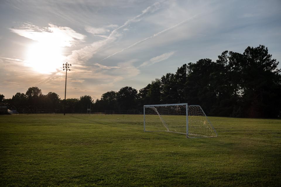 The sun sets over a soccer field in Franklin, Tenn., Wednesday, Aug. 2, 2023.