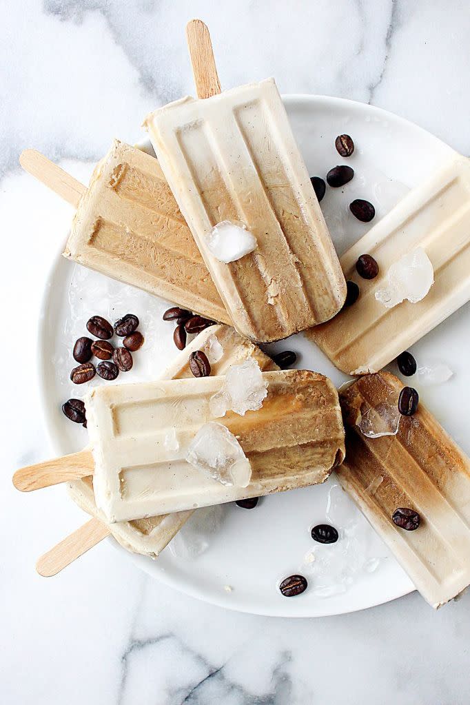 <p>Cool down from your egg hunt — adults only! — with a boozy iced coffee pop.</p><p><em><a href="http://yestoyolks.com/2016/06/20/kahlua-coconut-cream-affogato-popsicles/" rel="nofollow noopener" target="_blank" data-ylk="slk:Get the recipe from Yes to Yolks »;elm:context_link;itc:0;sec:content-canvas" class="link ">Get the recipe from Yes to Yolks »</a></em></p><p><strong>What you'll need:</strong> popsicle sticks ($6, <a href="https://www.amazon.com/Acerich-Sticks-Wooden-Popsicle-Length/dp/B01ECBIQAI/ref=sr_1_4?tag=syn-yahoo-20&ascsubtag=%5Bartid%7C10057.g.4252%5Bsrc%7Cyahoo-us" rel="nofollow noopener" target="_blank" data-ylk="slk:amazon.com;elm:context_link;itc:0;sec:content-canvas" class="link ">amazon.com</a>)</p>