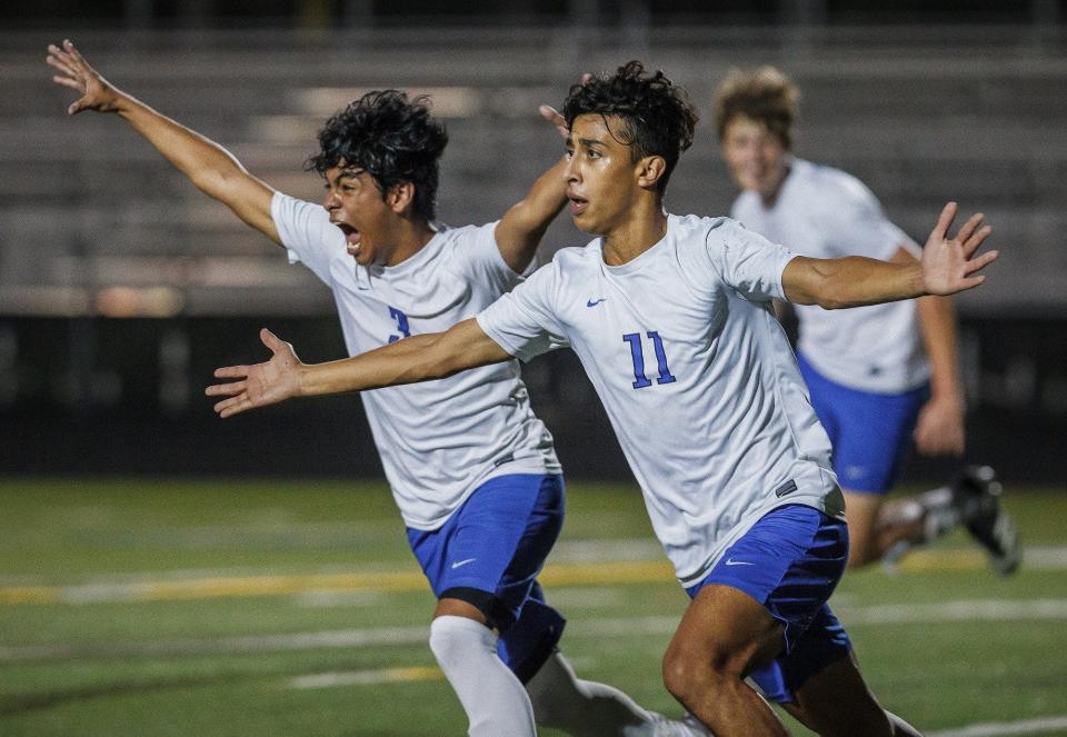 Spanish River High School Sharks Justin Ibrahim (11) celebrates his goal against the Boca Raton High School Bobcats after his header off a free kick found the back of the net during first half action of the 2022 Class 7A District 12 boys soccer championship game in Boca Raton.