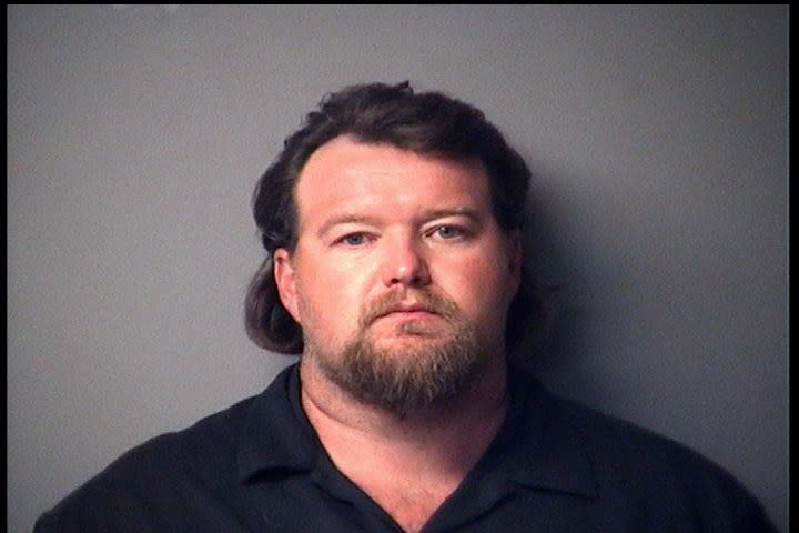 FILE - This booking photo provided by the Antrim County, Mich., Sheriff's Office shows Michael Null. Null is one of several charged, Oct. 8, 2020, in state court on charges involving a foiled plot to kidnap Michigan Gov. Gretchen Whitmer. (Antrim County Sheriff's Office via AP, File)