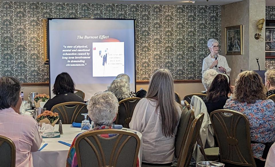 Donna White, a registered nurse, led 63 caregivers through a deep breathing exercise Thursday. White, a master trainer with the state Department of Mental Health, spoke at a caregiver lunch and expo offered by Elder Services of Cape Cod & Islands at Cape Codder Resort & Spa in Hyannis.