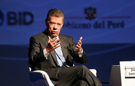 Colombia's President Juan Manuel Santos delivers a speech during the Americas Business Summit in Lima, Peru April 13, 2018. REUTERS/Andres Stapff