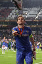 <p>Frank Lampard of Chelsea throws his boots to the fans.</p>