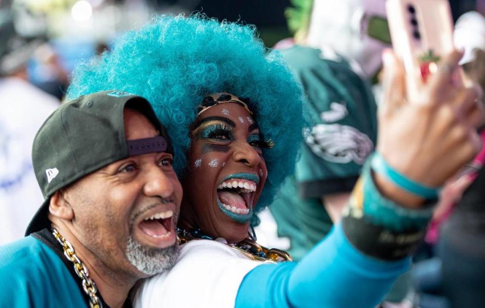 Dee Dee Ellis of Jacksonville, Florida, takes a video with her friend, Brian Alexander, during the NFL Draft outside of Union Station on Thursday, April 27, 2023, in Kansas City.