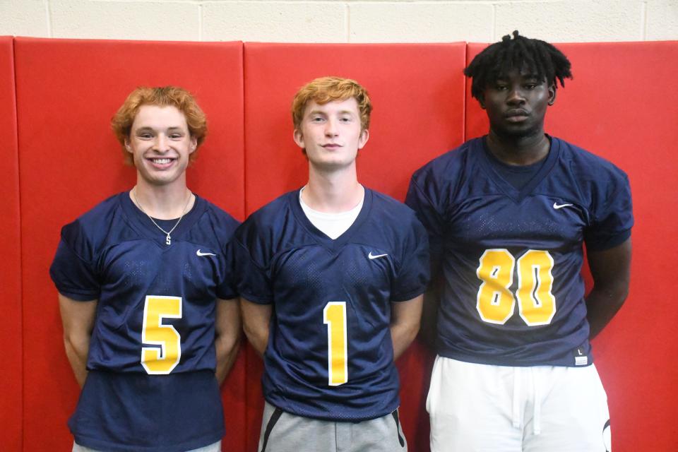 Greencastle-Antrim's Carter Coons (5), Logan Alvey (1) and Sallieu Bangura (80) take part in Mid-Penn Media Day at Cumberland Valley High School on Wednesday, August 2, 2023