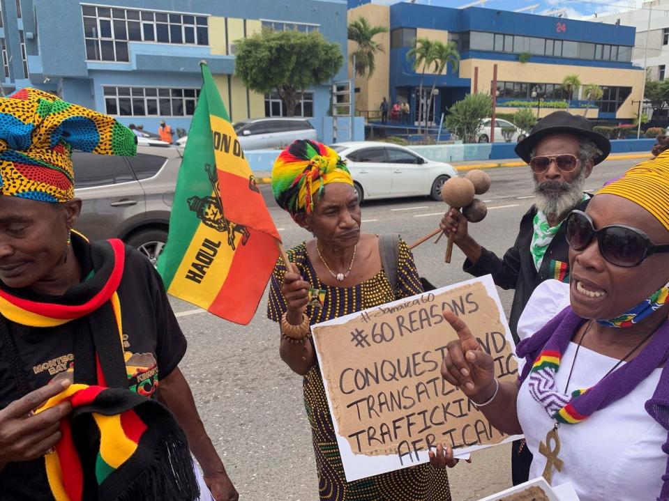 Protestors host a rally to demand that the United Kingdom make reparations for slavery, ahead of a visit to Jamaica by the Duke and Duchess of Cambridge as part of their tour of the Caribbean on March 22, 2022.