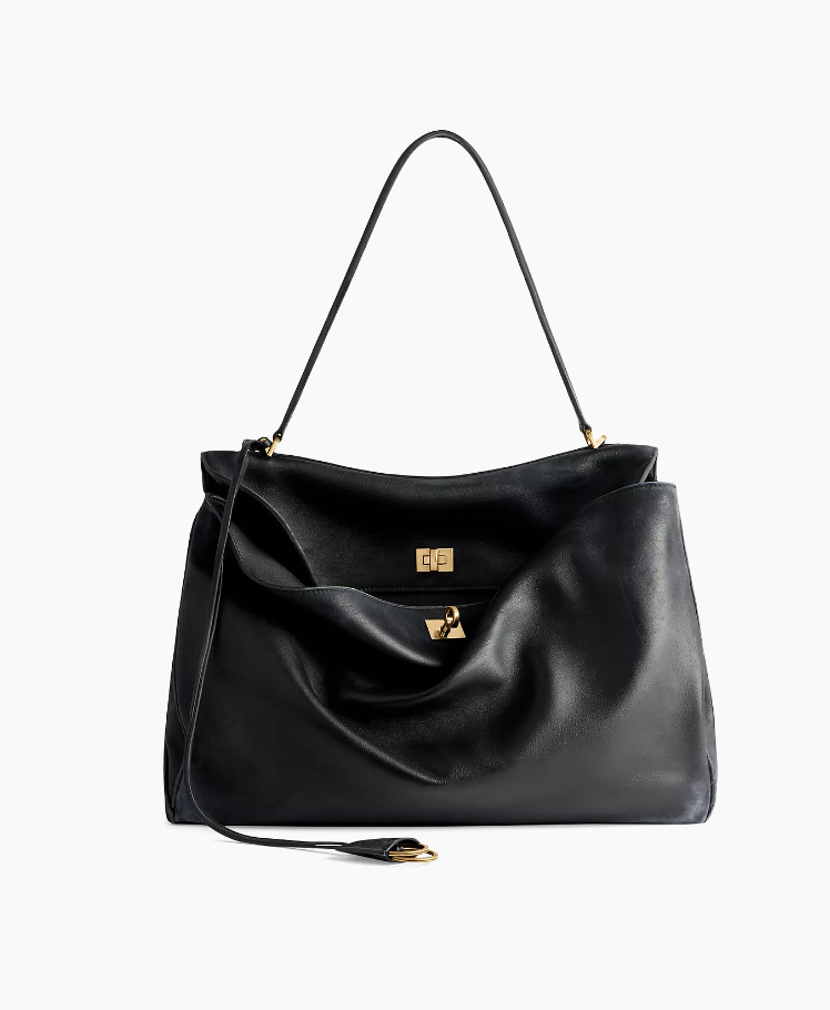 <p><a href="https://go.redirectingat.com?id=74968X1596630&url=https%3A%2F%2Fwww.saksfifthavenue.com%2Fproduct%2Fbalenciaga-rodeo-large-handbag-0400021564904.html%3Fdwvar_0400021564904_color%3DBLACK&sref=https%3A%2F%2Fwww.townandcountrymag.com%2Fstyle%2Ffashion-trends%2Fg61560977%2Fbest-work-totes%2F" rel="nofollow noopener" target="_blank" data-ylk="slk:Shop Now;elm:context_link;itc:0;sec:content-canvas" class="link rapid-noclick-resp">Shop Now</a></p><p>Rodeo Large Handbag</p><p>saksfifthavenue.com</p><p>$5190.00</p>