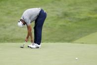 Coilin Morikawa reacts after missing a putt on the 18th hole during opening round of the Workday Charity Open golf tournament, Thursday, July 9, 2020, in Dublin, Ohio. (AP Photo/Darron Cummings)