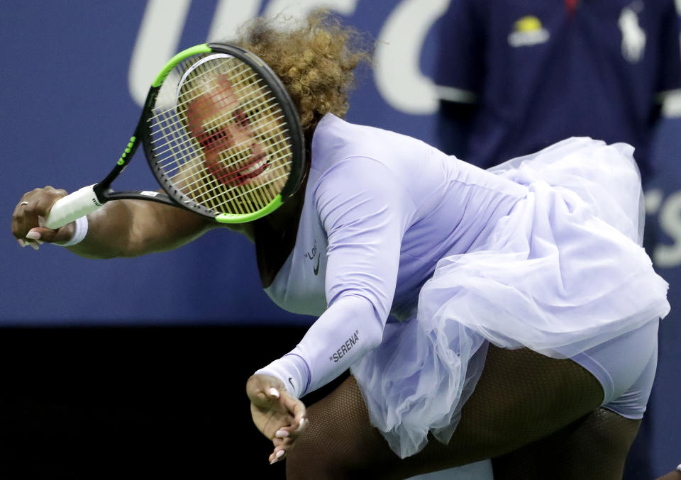 Serena Williams, of the United States, watches her return to Carina Witthoeft, of Germany, during the second round of the U.S. Open tennis tournament Wednesday, Aug. 29, 2018, in New York. (AP Photo/Julio Cortez)