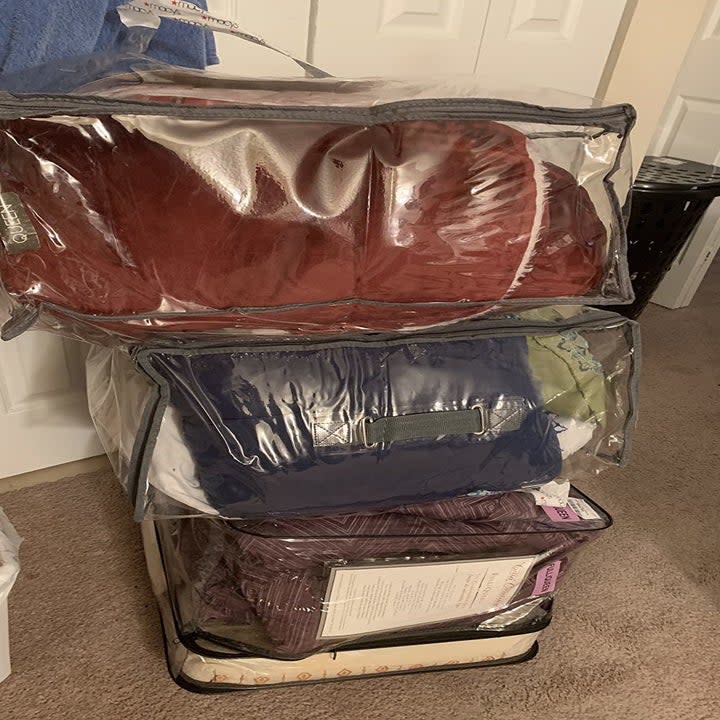 reviewer photo showing their storage bags before vacuuming the air out 