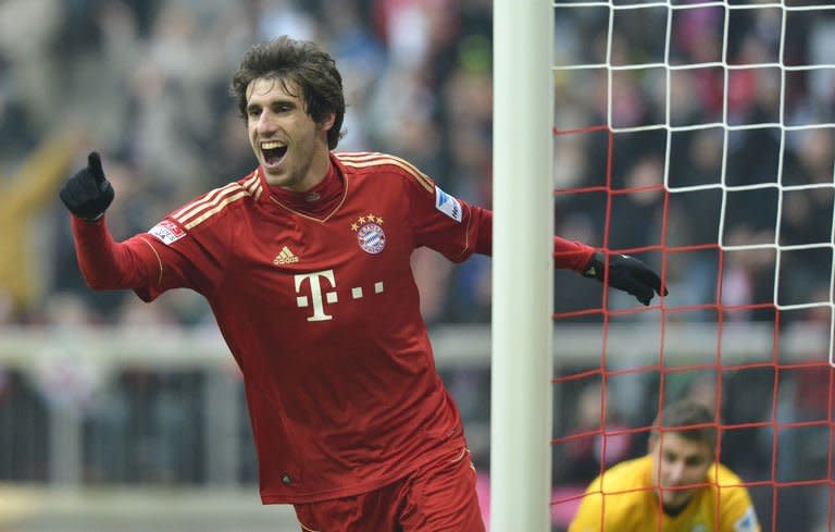 Bayern Munich's midfielder Javi Martinez celebrates a goal during their German first division Bundesliga football match against Werder Bremen in the southern German city of Munich on February 23, 2013. Bayern Munich rested half a dozen stars but still romped to a 6-1 win at home against 10-man Werder Bremen on Saturday to go 18 points clear at the top of the Bundesliga