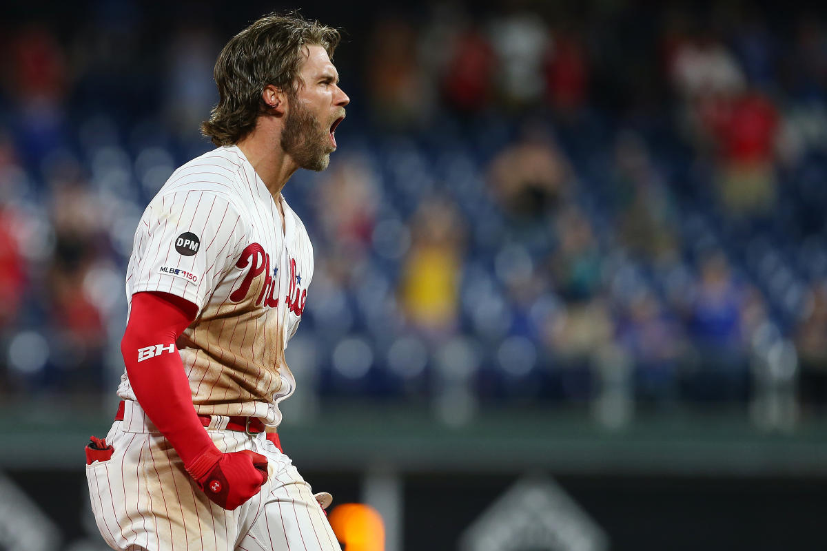 Bryce Harper of Philadelphia Phillies walks in the dugout before News  Photo - Getty Images