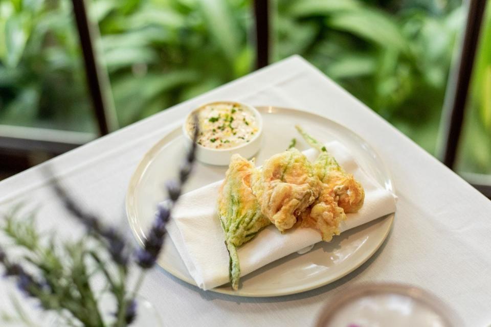 Fried zucchini blossoms are served at Café Boulud Palm Beach this summer.