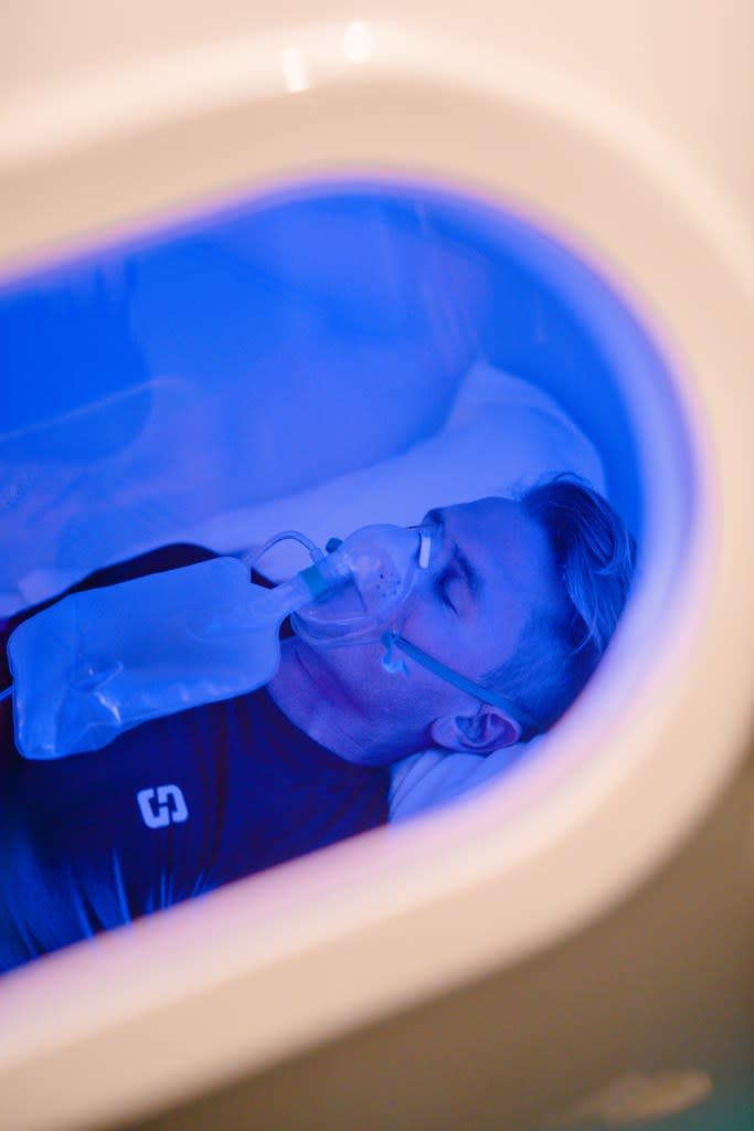 A guest at Six Senses Ibiza in a hyperbaric oxygen chamber.