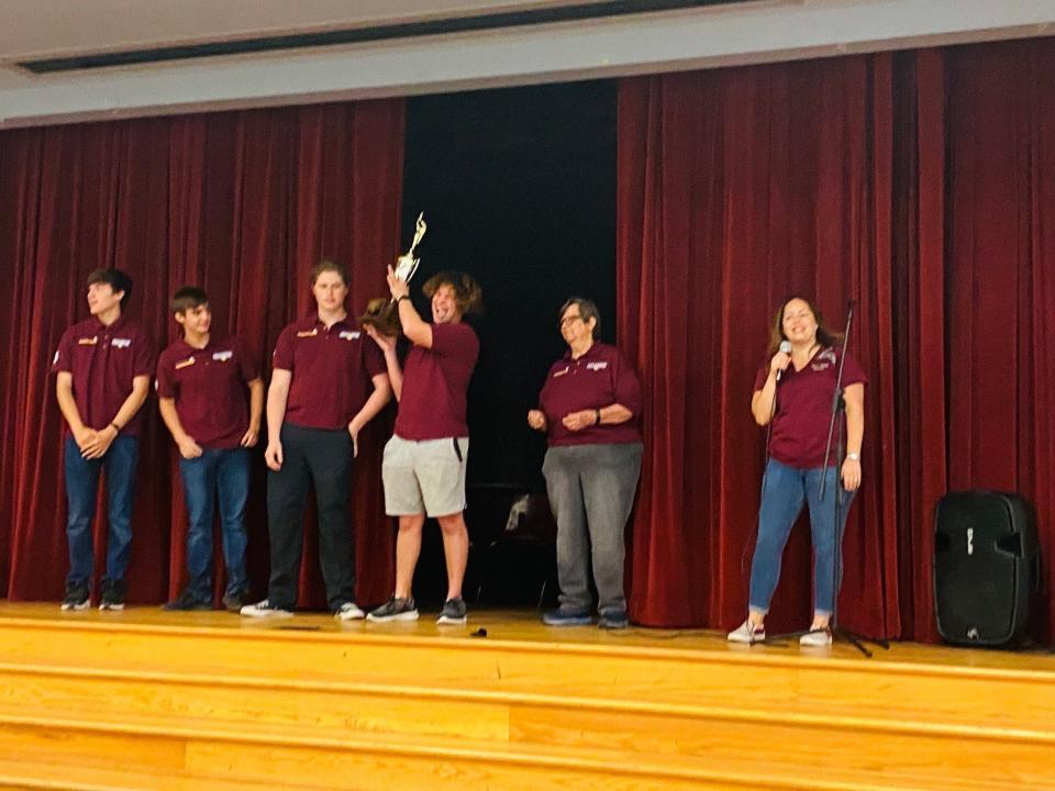 Flour Bluff High School students and their teacher Beth Huckabee are awarded a trophy after winning the KEDT Challenge on April 29, 2022. The team members were Kyle Pshigoda, Daniel Santos, Carlos Doble, Brannon Chapman and Jared Martin.