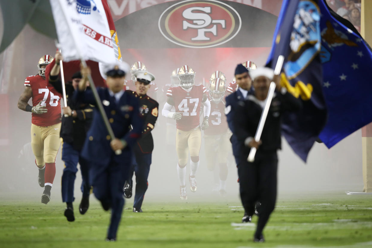 Fans concerned about air quality from nearby wildfires wore masks to Monday’s game between the Giants and 49ers. (Getty)