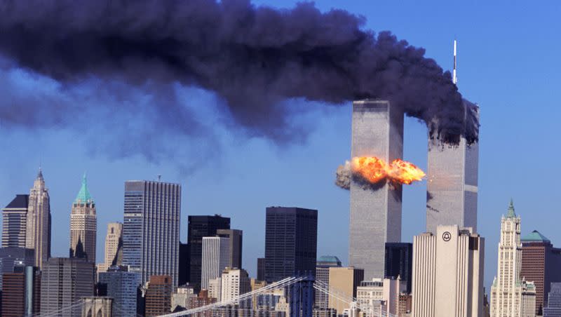 Hijacked United Airlines Flight 175, which departed from Boston en route for Los Angeles, crashes into the south tower of the World Trade Towers on Sept, 11, 2001. The north tower is shown burning after American Airlines Flight 11 crashed into the tower at 8:45 a.m.