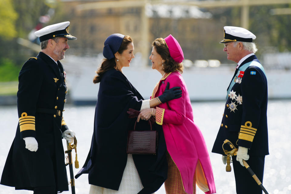 CAPTION CORRECTS SOURCE Denmark's King Frederik X, left and Queen Mary, are welcomed by Sweden's Queen Silvia, centre right and King Carl XVI Gustaf, upon their arrival, at Skeppsbron, in Stockholm, Sweden, Monday, May 6, 2024. Denmark’s King Frederik X has arrived in Stockholm, accompanied by his Australian-born wife Queen Mary, as he embarked on his first official visit abroad as new Danish monarch. (Ida Marie Odgaard/Ritzau Scanpix via AP)