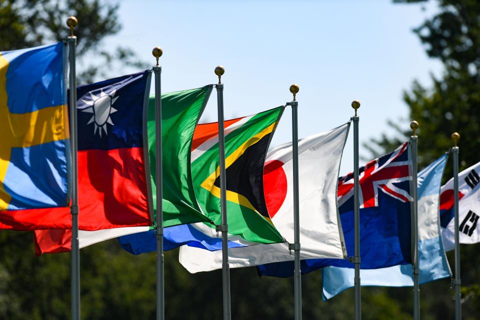 Flags from a variety of countries blow in the strong wind at the Sanford International golf tournament on Thursday, September 16, 2021, at the Minnehaha Country Club in Sioux Falls.