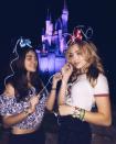 <p>The actress, known for roles on the Disney Channel series <em>Jessie </em>and<em> Bunk'd,</em> and a friend glowed purple alongside Cinderella's castle.</p>