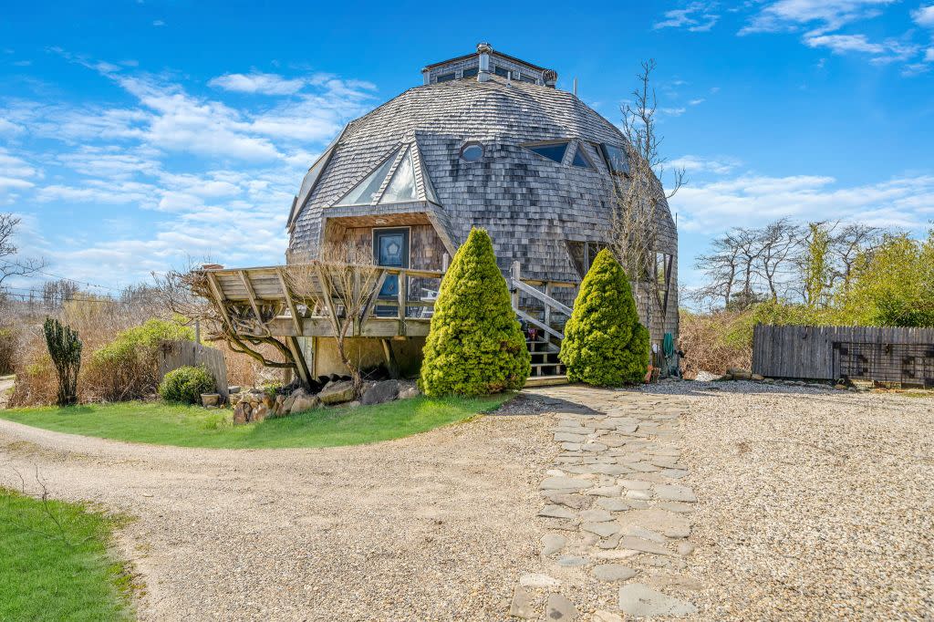 Montauk’s 54 E. Lake Drive — asking $2.59 million — boasts a wood-clad, geodesic-dome shape inspired by the work of architect Buckminster Fuller; it’s Zillow’s “most-viewed home on the East End,” according to the listing agent. PM Real Estate Photography