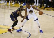 Jun 1, 2017; Oakland, CA, USA; Golden State Warriors forward Kevin Durant (35) is defended by Cleveland Cavaliers guard Kyrie Irving (2) in the first half of the NBA Finals at Oracle Arena. Mandatory Credit: Cary Edmondson-USA TODAY Sports