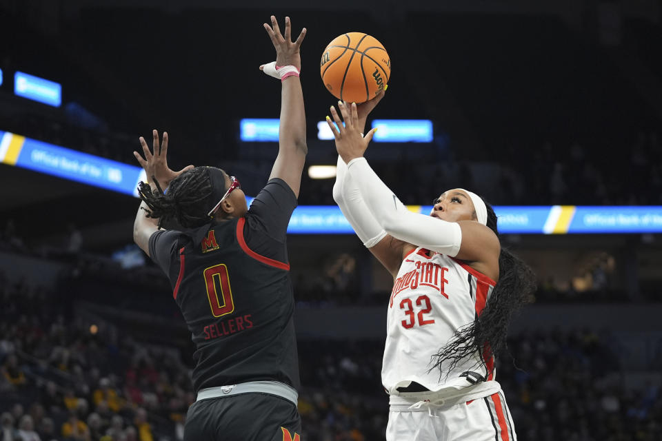 Ohio State forward Cotie McMahon (32) shoots over Maryland guard Shyanne Sellers (0) during the second half of an NCAA college basketball game in the quarterfinals of the Big Ten women's tournament Friday, March 8, 2024, in Minneapolis. (AP Photo/Abbie Parr)