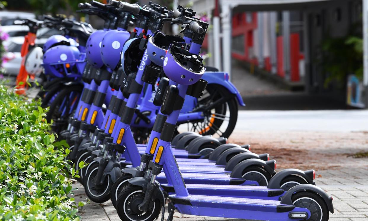 <span>Beam e-scooters in Brisbane. The council has cancelled the company’s licence to operate in the city.</span><span>Photograph: Jono Searle/AAP</span>