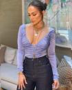 <p>Jennifer Lopez signalled the start of the weekend with a playful post that gives us ultimate '90s/00s vibes. </p><p>The singer offset her high-waisted selvedge denim with a ruches lilac deep-V top and stacked necklaces - every bit the pop star we grew up admiring. </p><p>She wore her hair scraped up in a chic ballerina-style bun, allowing the flattering neckline to stay in focus, and accessorised with an array of gold bling for good measure. </p><p><a href="https://www.instagram.com/p/CZAVMaZv4tQ/" rel="nofollow noopener" target="_blank" data-ylk="slk:See the original post on Instagram;elm:context_link;itc:0;sec:content-canvas" class="link ">See the original post on Instagram</a></p>