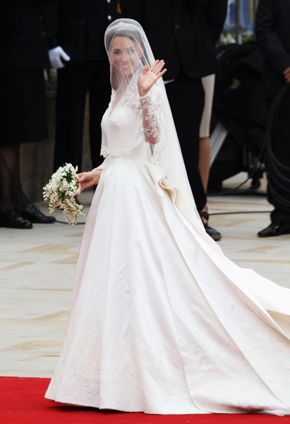 <p>For her big day, the Duchess of Cambridge opted for a lace gown designed by Alexander McQueen’s Sarah Burton. The floow-sweeping number incorporated lace, floral motifs and a seriously impressive train. It reportedly cost £250,000 and sparked a mass number of copies. <em>[Photo: Getty]</em> </p>