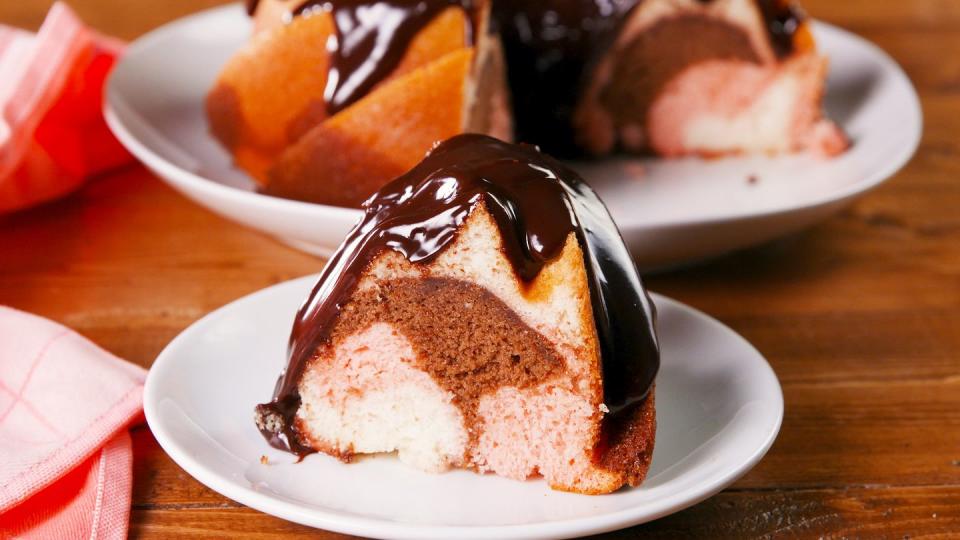 <p>3 flavors in 1.</p><p>Get the recipe from <a href="https://www.delish.com/cooking/recipe-ideas/a22998713/neapolitan-bundt-cake-recipe/" rel="nofollow noopener" target="_blank" data-ylk="slk:Delish;elm:context_link;itc:0;sec:content-canvas" class="link ">Delish</a>.</p>