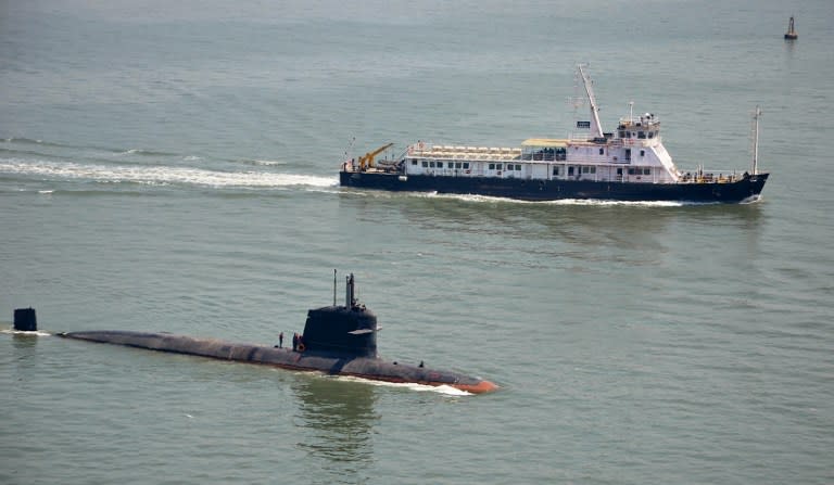 <p>In this handout photograph released by The Indian Navy on May 1, 2016, India’s Scorpene Class Submarine ‘Kalivari’ takes part in its maiden sea trials off the coast of Mumbai on May 1, 2016. </p>