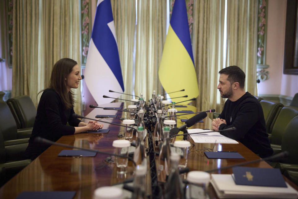 Finland's Prime Minister Sanna Marin and Ukrainian President Volodymyr Zelenskyy talk during their meeting in Kyiv, Ukraine, Friday, March 10, 2023. (Ukrainian Presidential Press Office via AP)