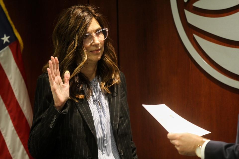 Sylvia Rhodea takes the Oath of Office as Vice Chair of the Ottawa Board of Commissioners on Tuesday, Jan. 3.