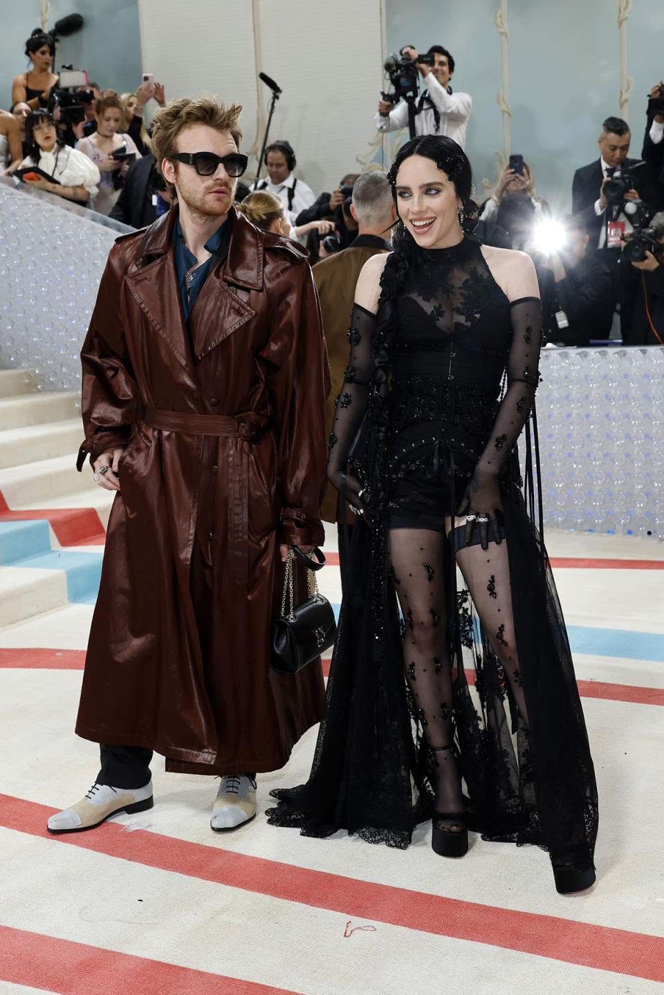 Siblings Finneas O'Connell and Billie Eilish donned contrasting outfits. Photo: Getty