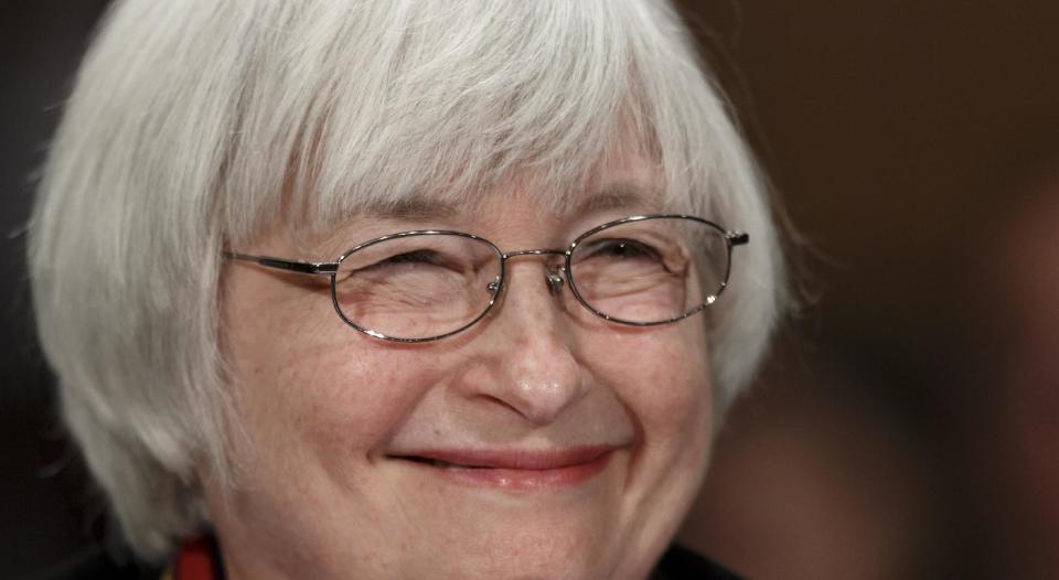 Federal Reserve Chair Janet Yellen smiles as she testifies on Capitol Hill in Washington, Thursday, Feb. 27, 2014, before the Senate Banking Committee to deliver the semiannual Monetary Policy Report to Congress. The report includes durable goods orders and U.S. fourth-quarter gross domestic product data. (AP Photo/J. Scott Applewhite)