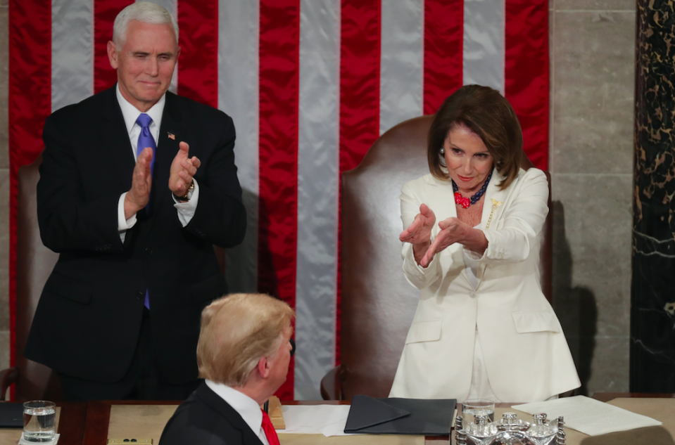 <em>Nancy Pelosi seems to sarcastically applaud Donald Trump during the State of the Union address (Getty)</em>