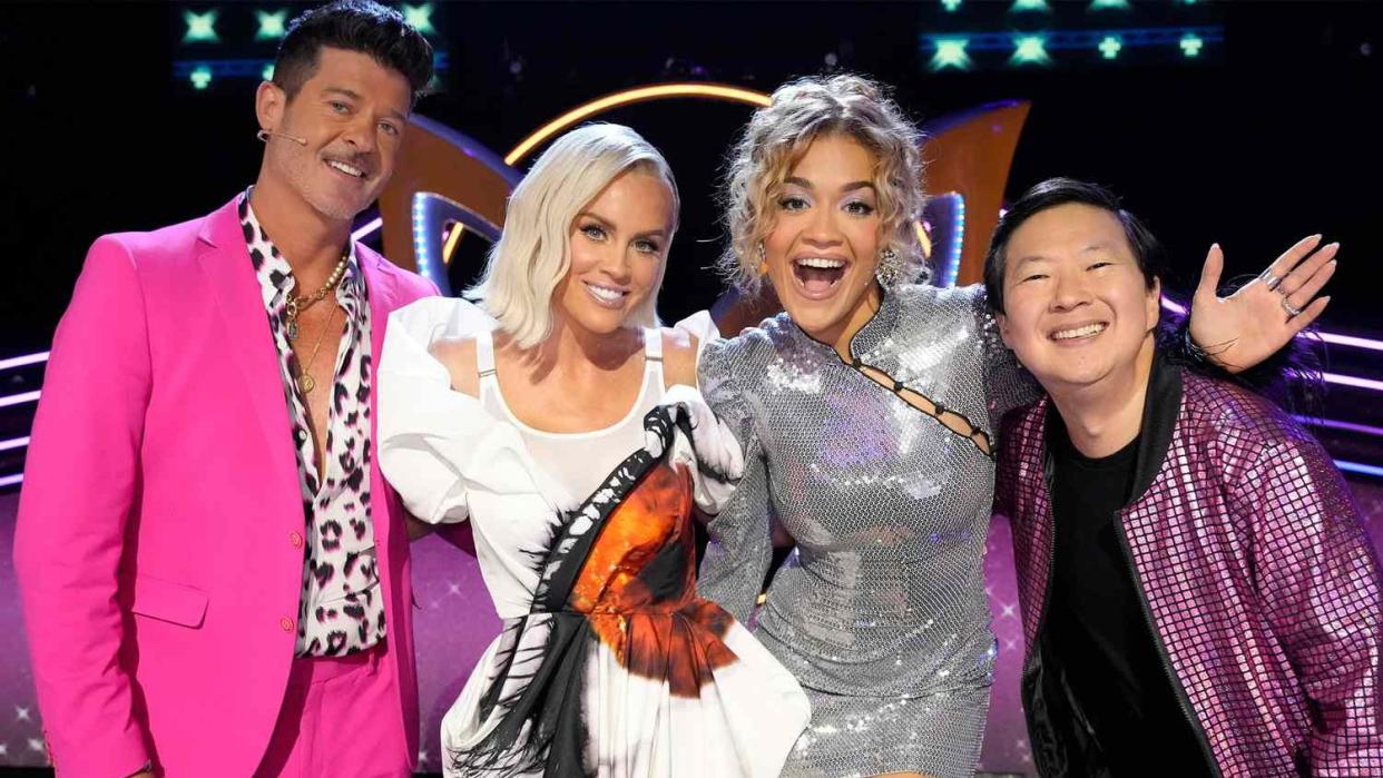  Panelists Robin Thicke, Jenny McCarthy-Wahlberg, Rita Ora and Ken Jeong pose in a promotional shot for The Masked Singer season 11. 